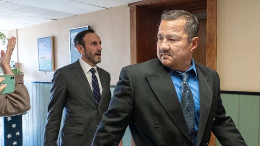 Former Marion Police Chief Gideon Cody enters the Marion County Courthouse on Oct. 7, 2024, with attorney Sal Intagliata for his first appearance in a low-level felony case.
