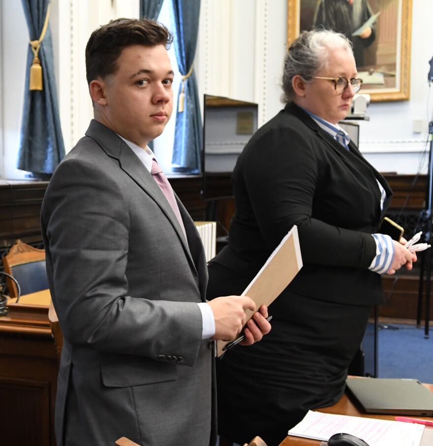 Kyle Rittenhouse and defense attorney Natalie Wisco at a break during jury selection on the first day of the Kyle Rittenhouse trial in Kenosha Circuit Court Monday November 1, 2021. Rittenhouse faces seven charges including one count each of First Degree Intentional Homicide, First Degree Reckless Homicide, and Attempted First Degree Intentional Homicide. Rittenhouse, then 17, shot three people, two of them fatally during the unrest that followed the shooting of Jacob Blake seven times by a Kenosha police officer.