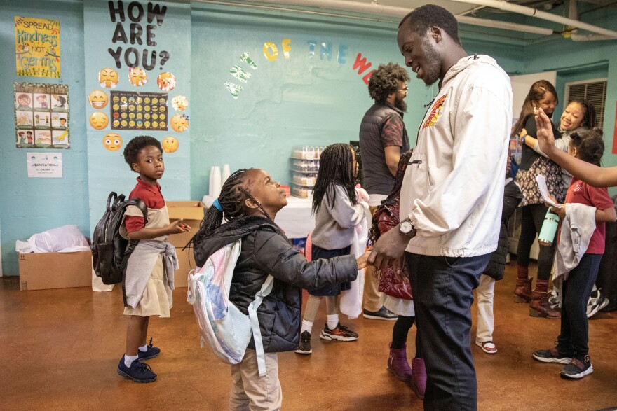 MEMPHIS: Director of Diversity, Equity and Inclusion Isaac James greets children at the Memphis Refugee Empowerment Program on Feb. 15. <a href="https://www.npr.org/2023/05/12/1165055943/black-immigrants-memphis-nashville-tennessee">See the story.</a>