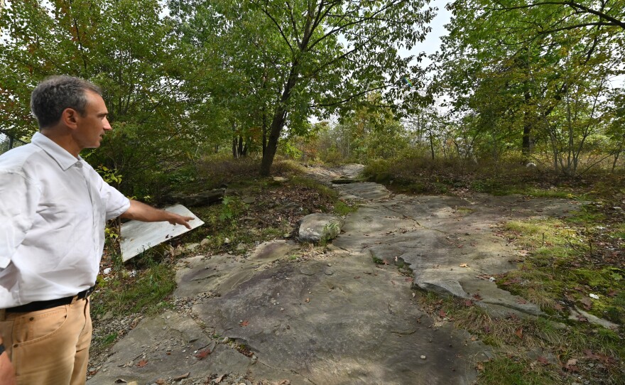 Gus Fahey points to an area of the trail from Connell Park in Scranton.