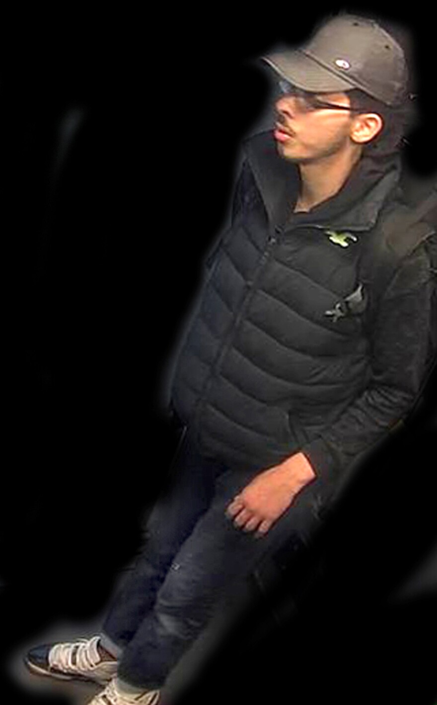 A photo issued Saturday by the Greater Manchester Police shows Salman Abedi in an unknown location on May 22, the night of the Manchester Arena attack. Police altered the background of the image.