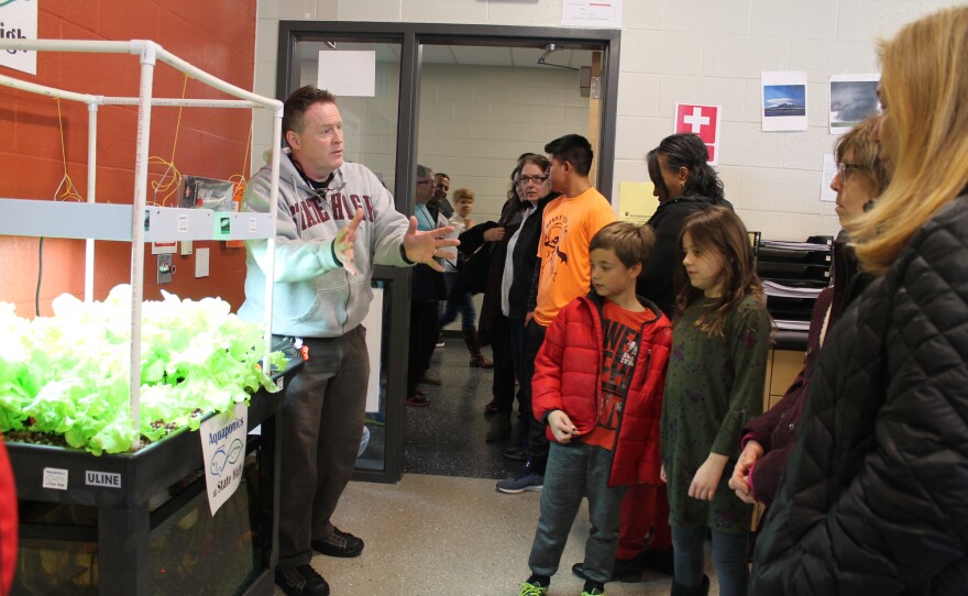 Andy Wilson teaches social studies at State High. He showed off the Aquaponics systems during the open house.