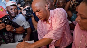 Then-candidate Michel Martelly casts his ballot at a polling station during a presidential runoff in Port-au-Prince, on March 20.