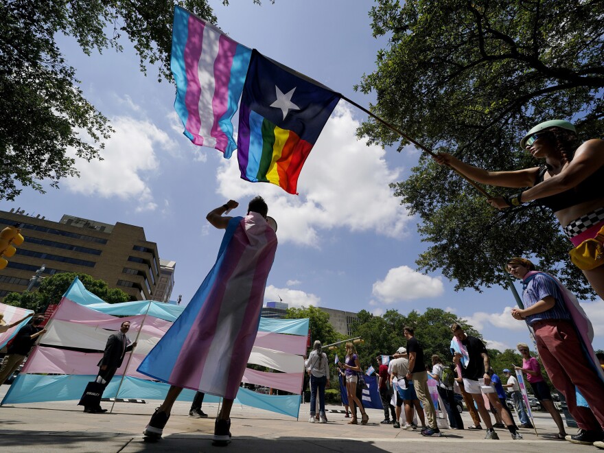 Demonstrators gather on the steps to the Texas State Capitol in Austin to speak against transgender-related bills being considered in the state legislature in May 2021.