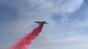 An air tanker makes a drop on the Foothill Fire in the Cuyama Valley Tuesday afternoon.