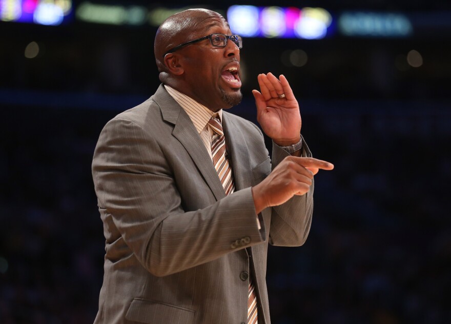 Former head coach Mike Brown of the Los Angeles Lakers gives instructions during the game against the Los Angeles Clippers in November.