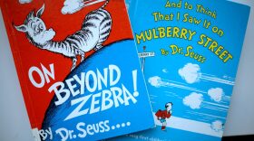 Books by Theodor Seuss Geisel, aka Dr. Seuss, including "On Beyond Zebra!" and "And to Think That I Saw it on Mulberry Street," are offered for loan at the Chinatown Branch of the Chicago Public Library in Chicago, Illinois.