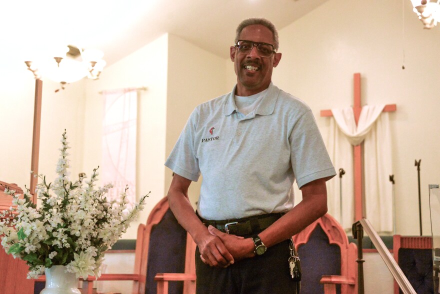 Rev. Milford Griner, pastor for 37 years and community leader, stands inside of Bartley Temple United Methodist Church in Gainesville, Fla., on May 5, 2023. (Caleb Ross/WUFT News)