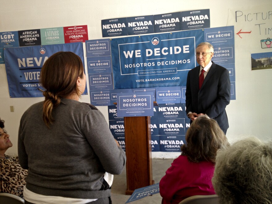 Senate Majority Leader Harry Reid of Nevada takes questions from Latino volunteers at an Obama field office in Las Vegas.
