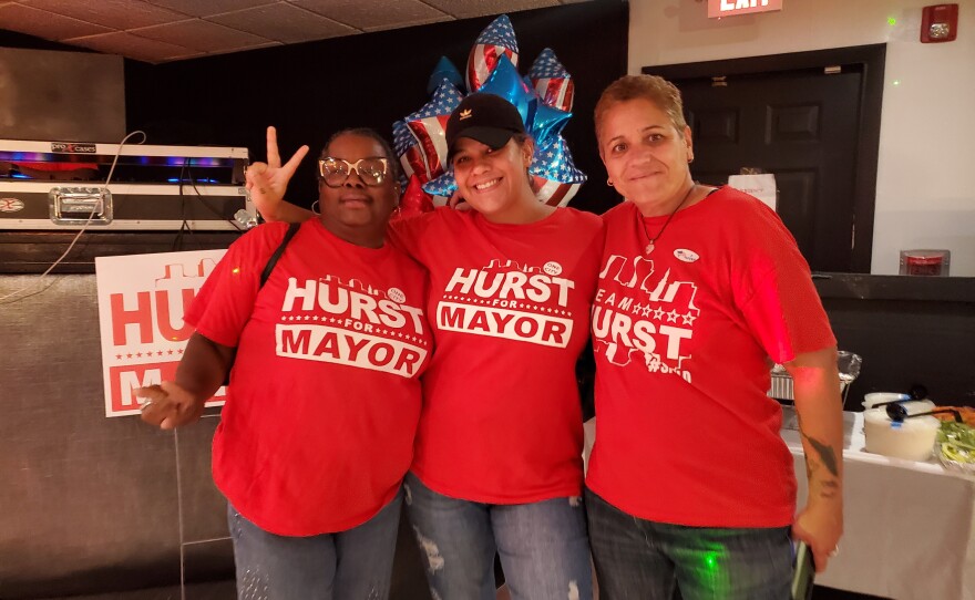 Supporters of mayoral candidate Justin Hurst wait for his arrival at Marlee's Restaurant and Bar on Boston Road in Springfield, Mass. From left to right are  Chekquita Barnes, Erica Cruz and Linda Cuevas. 