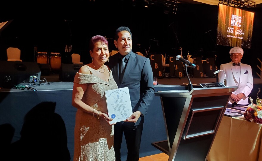 New North Citizens Council celebrates 50 years of serving Springfield residents at MGM Springfield on Sept. 22, 2023.  Maria Ligus, the executive director of NNCC, receives a citation from state Rep. Carlos Gonzalez, D-Springfield. 