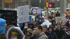 Some protesters carried signs and led chants against Indiana Gov. Mike Braun and billionaire Elon Musk, two Trump allies who share his vision for the country.
