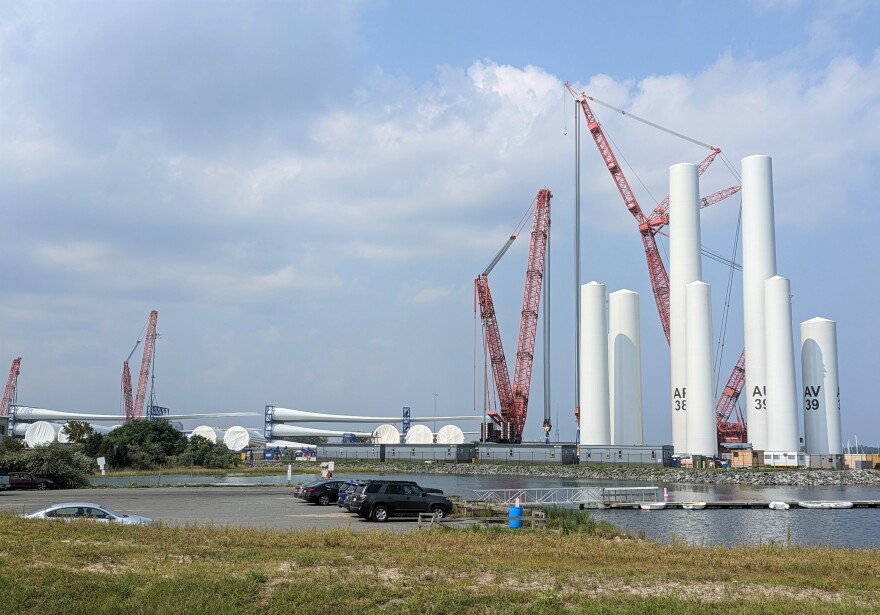 Offshore wind turbine components are stored at the New Bedford Marine Commerce Terminal before shipping out to Vineyard Wind.