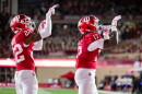 Indiana defensive back Jamari Sharpe (22) and defensive lineman Daniel Ndukwe (17) react after scoring a safety against Northwestern during the first half of an NCAA college football game, Friday, Sept. 25, 2026, in Bloomington, Ind. (AP Photo/Doug McSchooler)
