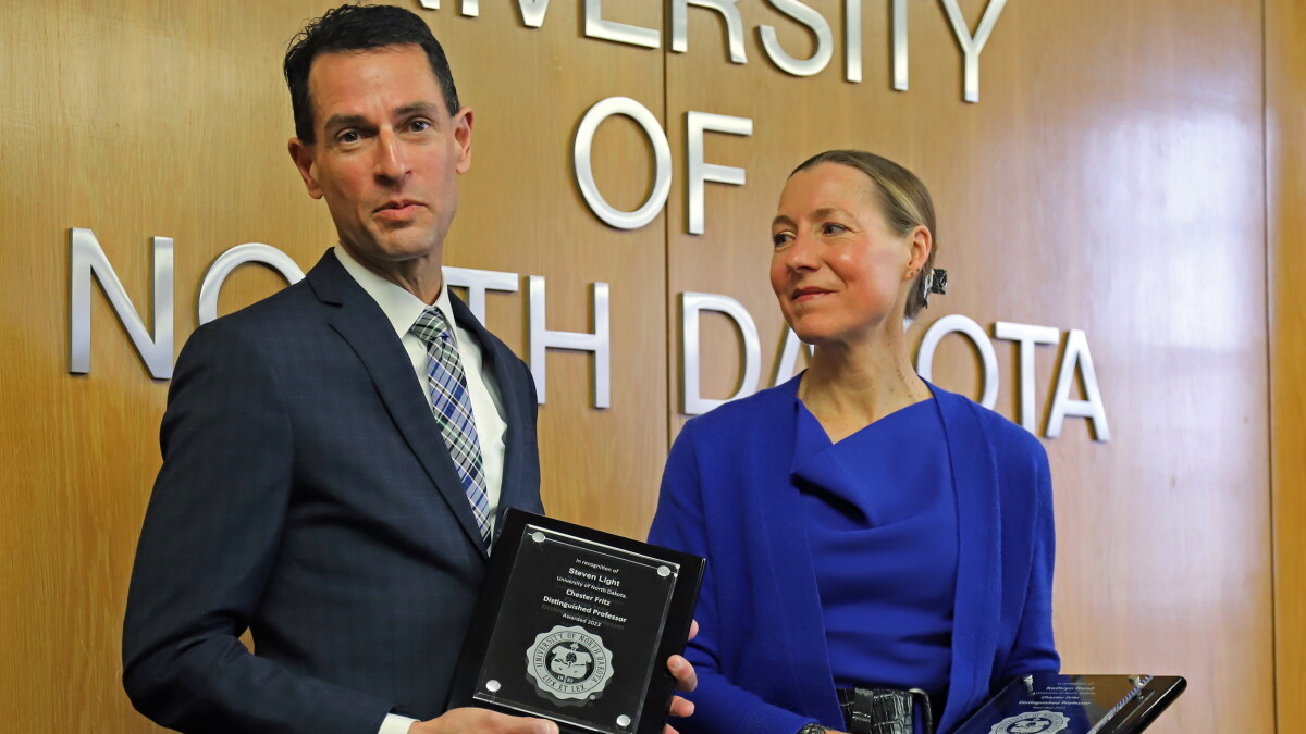 Distinguished UND Professors Rand and Light ~ Dan Bielinski, director of "Sanctified" ~ Poetry Profile: Emily Dickinson - Vimarsana News