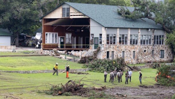 Law enforcement agents outside of a building at Camp Mystic on July 6, 2025.