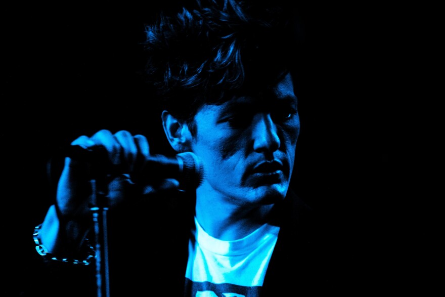 a man with a microphone