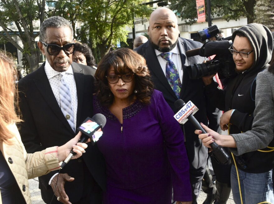 Former congresswoman Corrine Brown walks into Federal Court accompanied by pastor Rudolph McKissick, Sr. Brown appeared in Federal Court to be sentenced on fraud charges. Her former chief of staff, Ronnie Simmons and One Door for Education President Carla Wiley will also be sentenced. (Bob Mack/The Florida Times-Union via AP)
