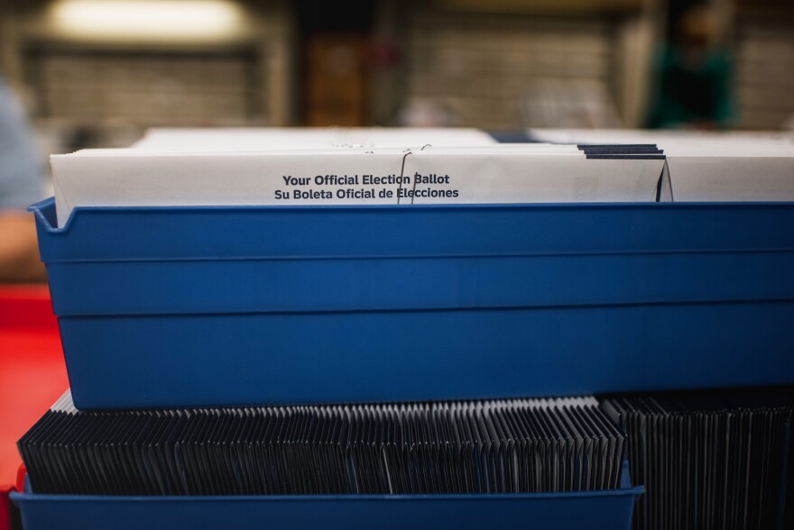 Ballot envelopes sit in a bin at the Voter Registration office. Election workers everywhere are doing what they can to adjust to court cases and changing rules around voting in Pennsylvania.