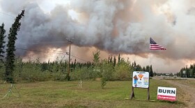 Smoke rises from the Mukluk Fire outside the Tok Forestry & Fire Protection office. August 17th.
