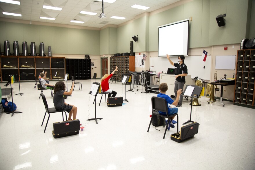 Stone Wang teaches band at Walsh Middle School in Round Rock.