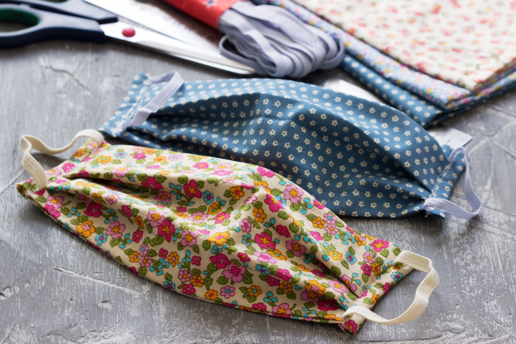 Health officials say handmade cloth face masks like these can help limit the spread of COVID-19 from the wearer to others.