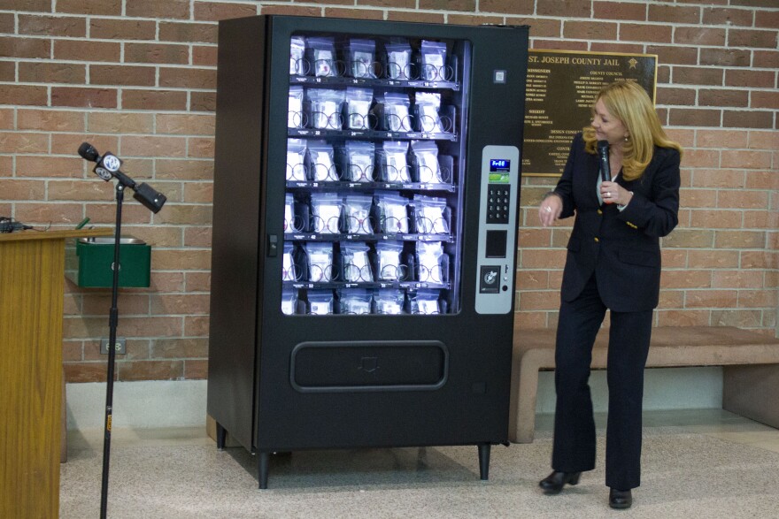 Indiana nonprofit Overdose Lifeline is purchasing and installing the machines. Executive director Justin Phillips demonstrates how to use the one installed in the St. Joseph County Jail. (Jakob Lazzaro / WVPE)