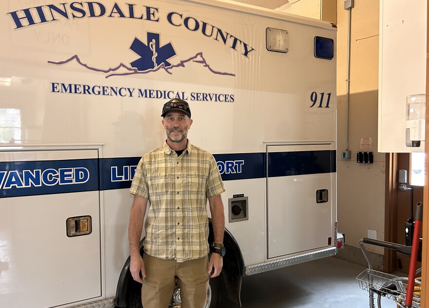 Hinsdale County EMS Interim Director and Chief Paramedic David Jepsen stands inside the ambulance barn in Lake City.
