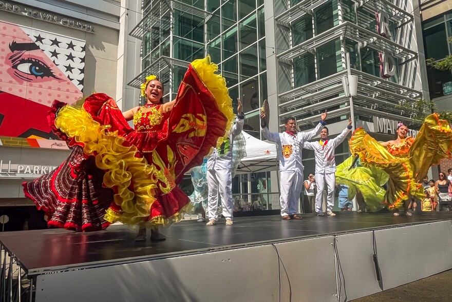 Paola Garcia (front left) is dancing cumbia, a traditional coastal Colombian courtship dance, with her peers from the Ballet Folklorico de las Americas. The Latin dance company organized the Colombian Carnival in Stamford Town Center on Sunday, July 20, in observance of Colombian Independence Day. They danced to a cumbia classic: "La Pollera Colora" or "The Red Skirt."