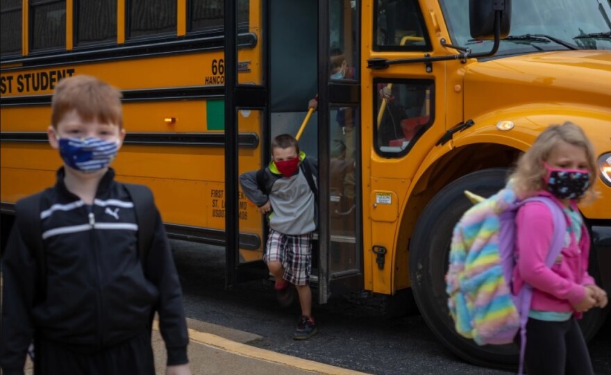 2020_Filephoto_RyanDelaney_masks_at_school_bus.jpg