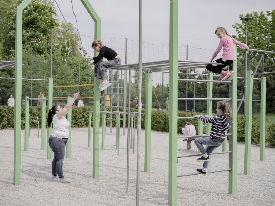 Ukrainian children play on the playground near Poland's Warsaw Ukrainian School.