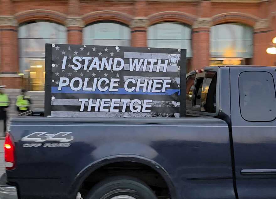 A truck with a large sign that reads "I stand with Police Chief Theetge" drove past Music Hall as people entered to attend Mayor Aftab Pureval's fourth State of the City Address.