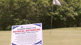 Players are prohibited from touching flag sticks on the course to prevent any kind of spread.