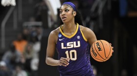 LSU forward Angel Reese (10) brings the ball up court during the first quarter of an Elite Eight round college basketball game against Iowa during the NCAA Tournament, Monday, April 1, 2024, in Albany, N.Y. (AP Photo/Hans Pennink)