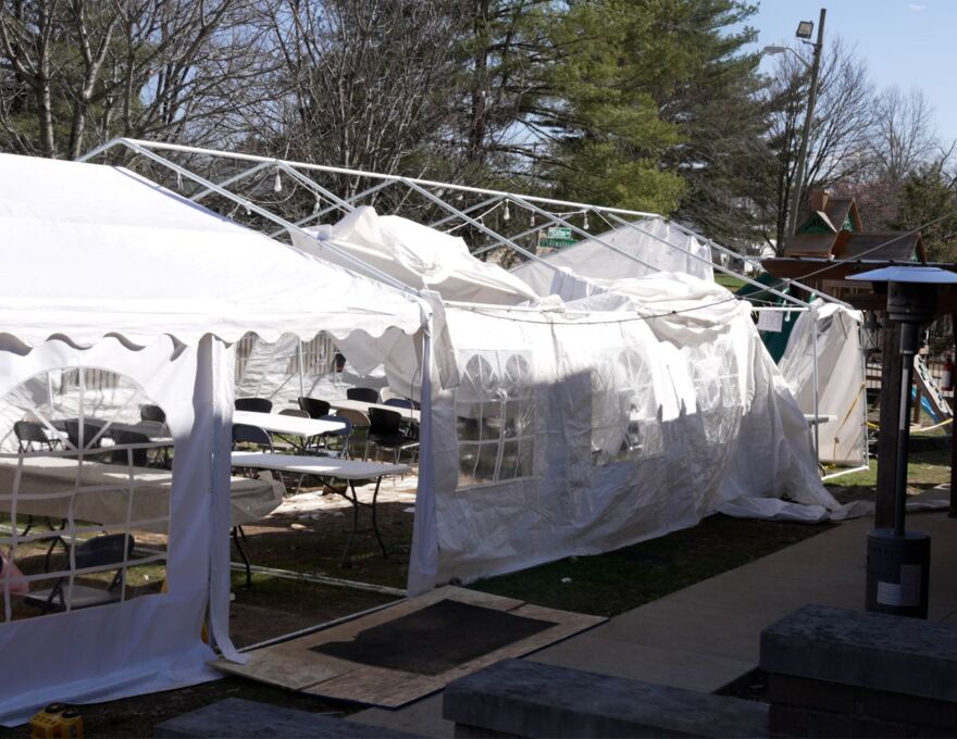 One of the tents placed outside to serve meals for Ramadan broke.