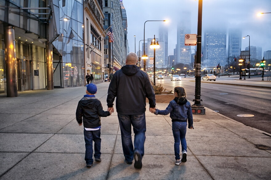 Family walking down Michigan Avenue in Chicago.