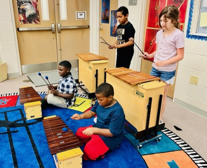 Students engage in music instruction as part of the early childhood music education incentive pilot program at Irby Elementary School in Alachua. 