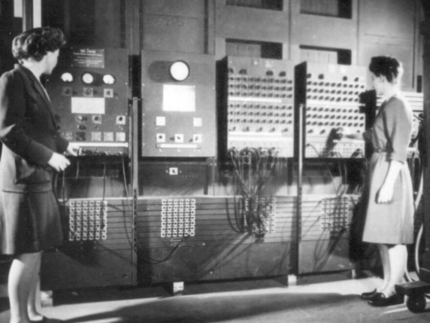 Female programmers inducted into the Women in Technologies Hall of Fame for their work on the ENIAC, an early computer built in 1946, work on the computer.