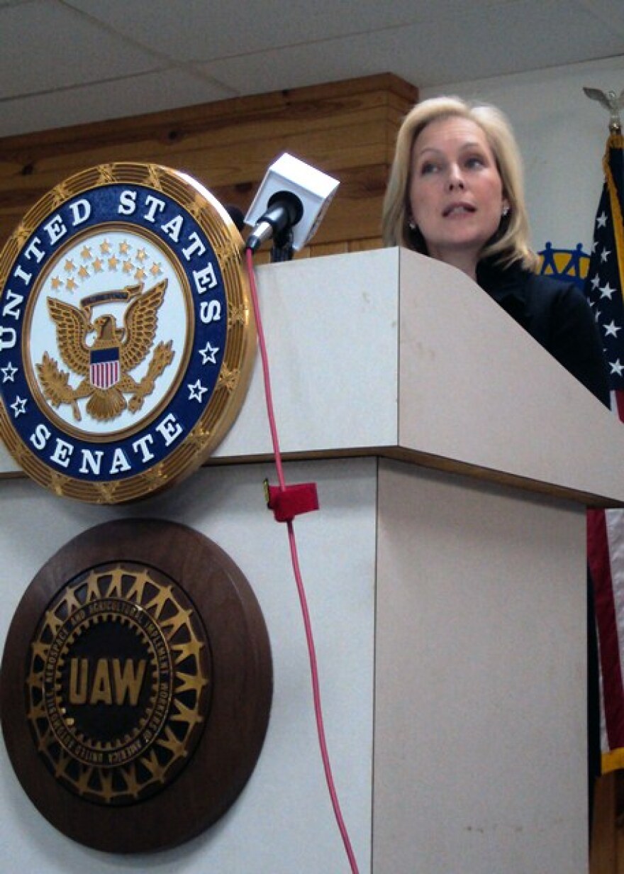 Sen. Kirsten Gillibrand stopped by a United Auto Workers union hall in Syracuse Monday to trumpet support for new tariffs.