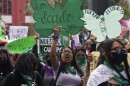 A woman holds up a sign with a message that reads in Spanish; "I will decide" as she joins a march demanding legal, free and safe abortions for all women, marking International Safe Abortion Day, in Mexico City, Sept. 28, 2022. Mexico’s Supreme Court on Wednesday, Sept. 6, 2023, has decriminalized abortion nationwide.