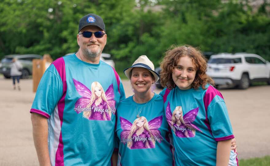 The Vanmeter family wearing shirts featuring the non-profit's logo. Alana's parents, Sarah and Adam Vanmeter, founded the non-profit to honor their daughter's legacy