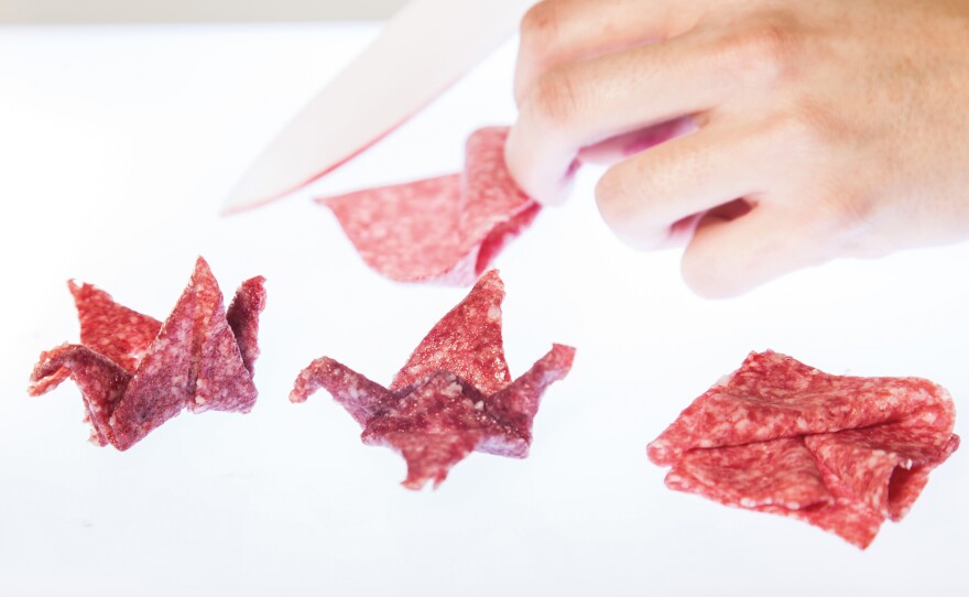 Lab-grown meat is often cultured in sheets no more than a few cells thick. Our chefs are skilled at the art of origami and make use of the wafer thin proportions to fold flowers and animals from crane meat.