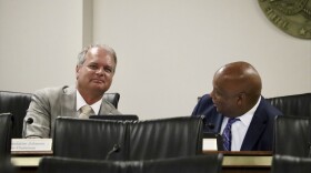 South Carolina Republican Rep. Jeff Johnson and Democratic Sen. Gerald Malloy speak before a conference committee meeting in Columbia, S.C. on Wednesday, June 14, 2023. Both state legislative chambers on Wednesday overwhelmingly approved a bill that would require the payment of a full cash bond to post bail for people charged with a second violent or firearm-involved offense while out on pretrial release for a first offense. (AP Photo/James Pollard)
