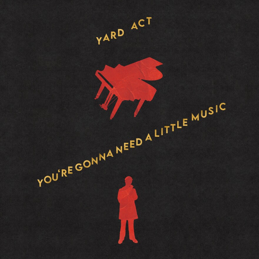 A red piano and person over a black background. In yellow lettering it says "Yard Act" and "You're Gonna Need A Little Music."
