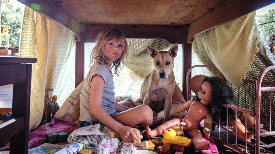 Film still of child actress Lexi Venter as Alexandra "Bobo" Fuller in the 2024 film Don't Let's Go to the Dogs Tonight.