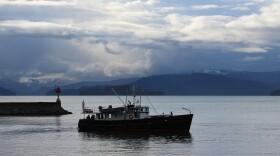A boat leaving a dock