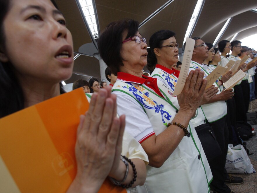 At Kuala Lumpur International Airport on Sunday, prayers were said for the 239 people who have been missing since flight MH370 disappeared.