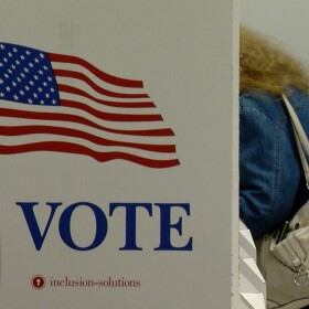 A woman in Illinois takes advantage of early voting in Sangamon County on Thursday. Voters in nearly every county can begin casting ballots for the November election, either at early voting locations or via mail-in ballot.