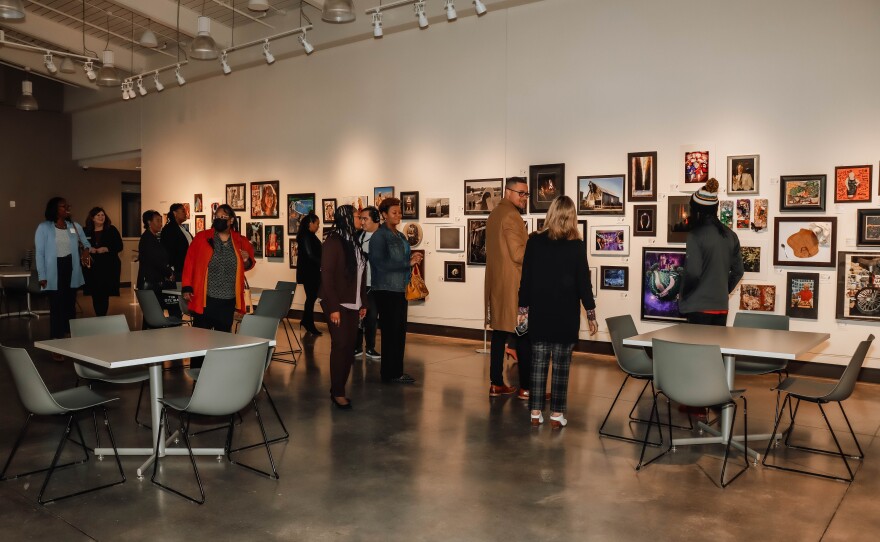 Gathering attendees take a tour of Mark Arts.