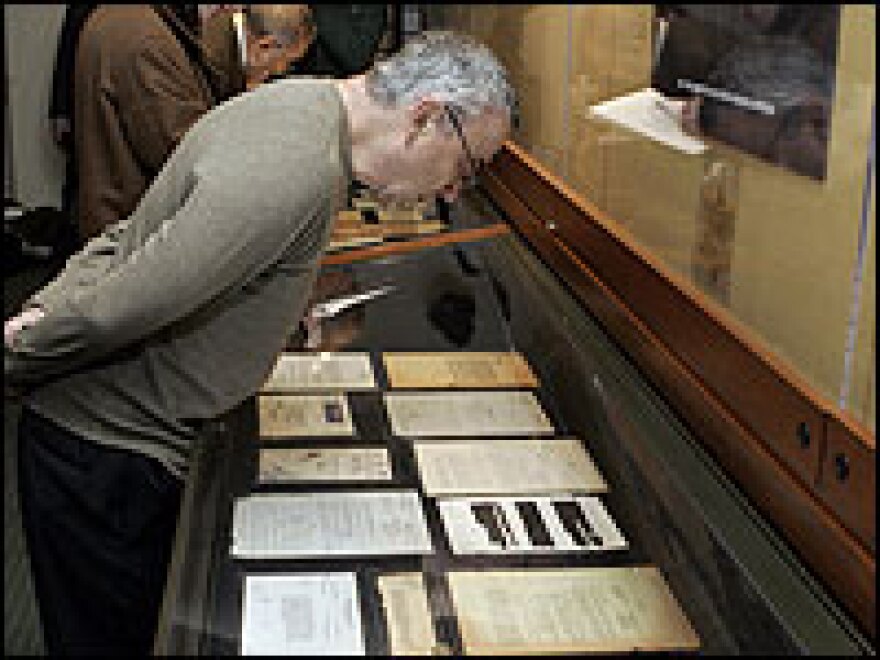 Journalists view a display of documents discovered in the YIVO Institute for Jewish Research archives by a volunteer last year.